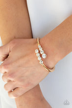 Load image into Gallery viewer, Paparazzi's Defying Dazzle - Gold bracelet
